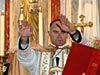 Bishop Fellay conferring the sacrament of confirmation