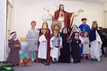 children dressed up in saints costumes