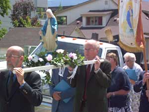 Our Lady is carried on a platform