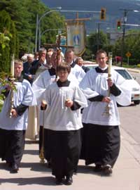 altar boys at the front of the procession