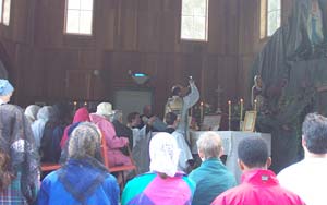 Fr. Boulet elevates the chalice