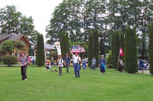 pilgrim with flag arrives at the park