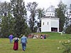 Pilgrims climb the last hill to the grotto of Our Lady of Lourdes