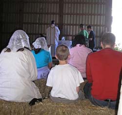 sitting on straw bales