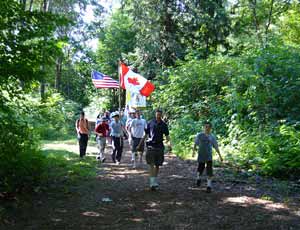 pilgrims with flags