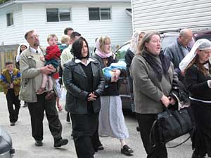 parishioners processing around church