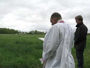 Fr. Mery blesses the fileds