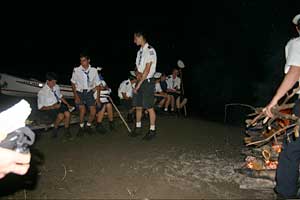 Boys Scouts at camp fire