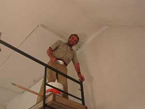 Painting the ceiling on scafolding