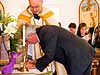 Parishioner signs pledge of consecration to Mary