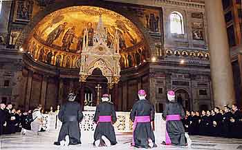 Text Box: Our four Bishops kneeling before the tomb of Saint Paul in St Paul basilica
