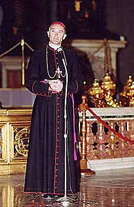 Text Box: Bishop Fellay addressing the pilgrims in St Peters Basilica in August
