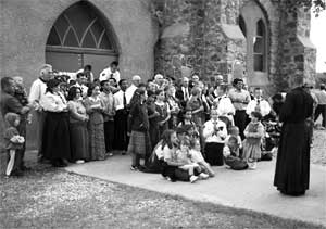 Pilgrims assemble outside the shrine