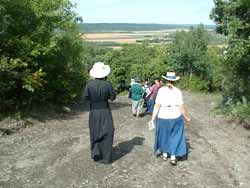 priest and faithful on pilgrimage