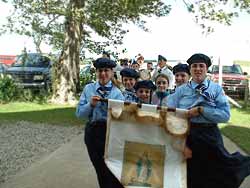 Girl Guides carry Our Lady's banner