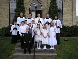 First Communicants on front steps