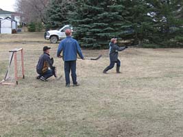 A lunch-time game of filed hockey