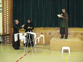 priests judging saint presentation