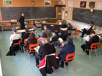 Father Scott give the first Adult Catechism class