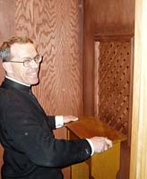 Fr Scott in the new confessional