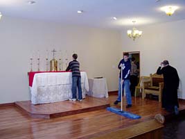 sweeping and setting up the altar