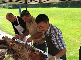 carving the pig roast