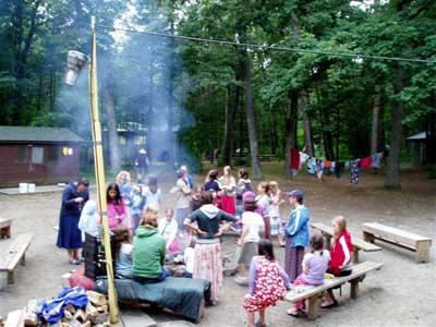 girls around the campfire