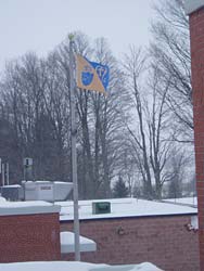 OLMC flag on a wintry day