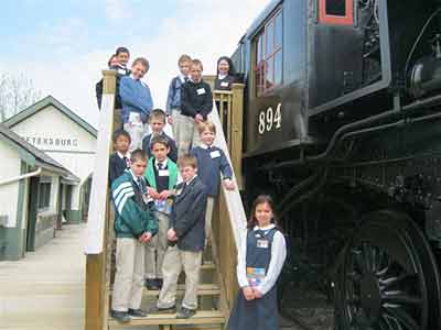 Student by steam train