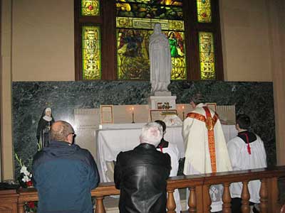 Mass at the altar of St. Therese