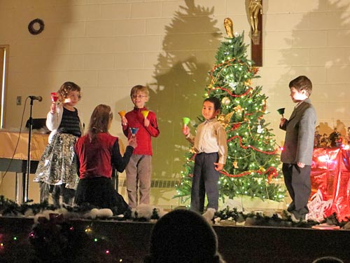 children with hand bells