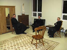 priests relaxing in study