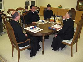 priests at table